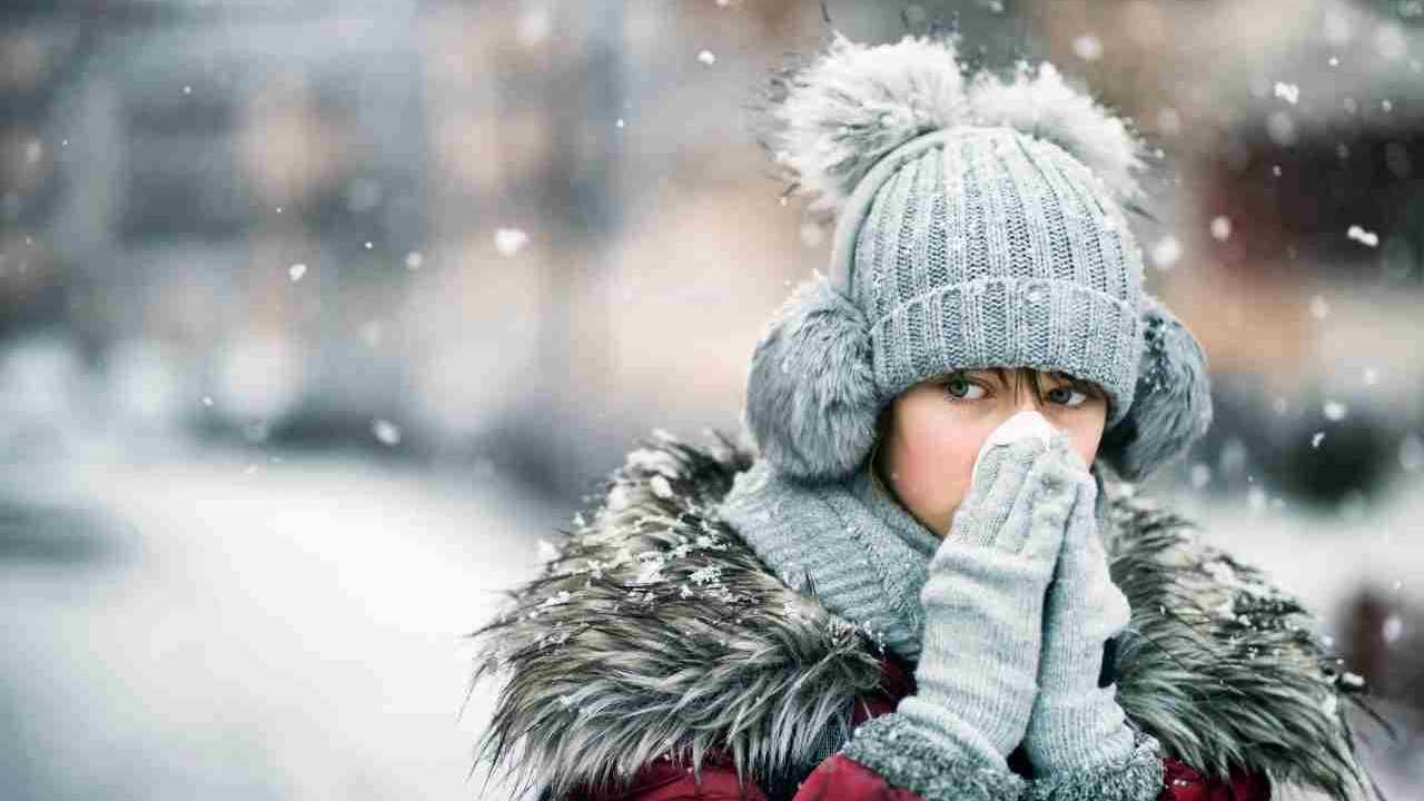 Sciarpe e cappelli per ripararsi dalla neve